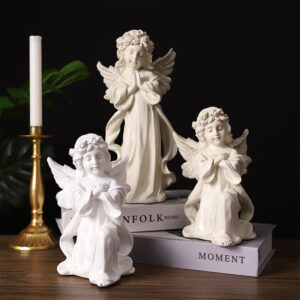 three close eyes white girls angel crafts for kids,one on the book and put hands together in front of you chest,anther two girls angel in front of you chest.