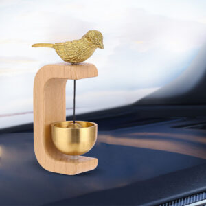 The brass bell with a bird standing on a wooden frame can be used as a gift, a car ornament, or a home ornament